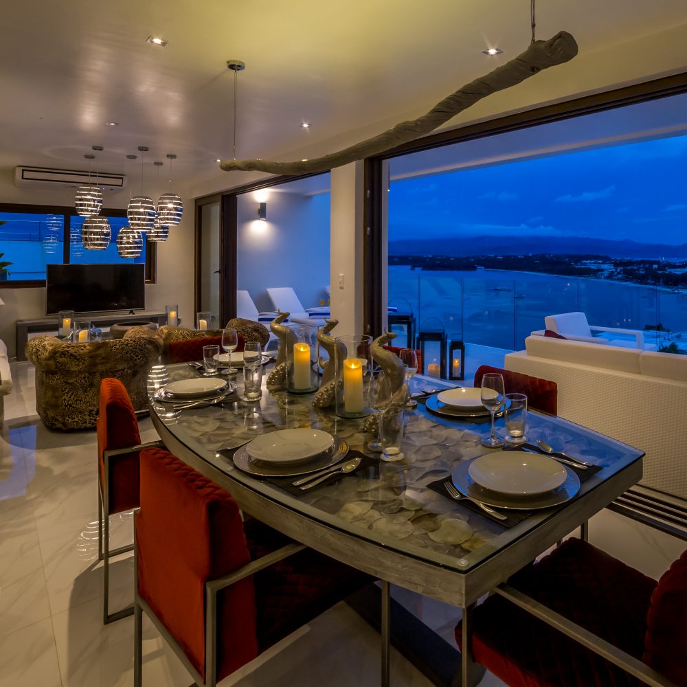 Dine in elegance with a view of the coast and greeneries.