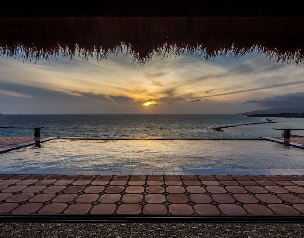A view to remember with the refreshing infinity pool and the azure waters of Boracay.
